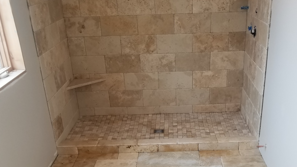 Shower and floor shows professional custom tile design & installation